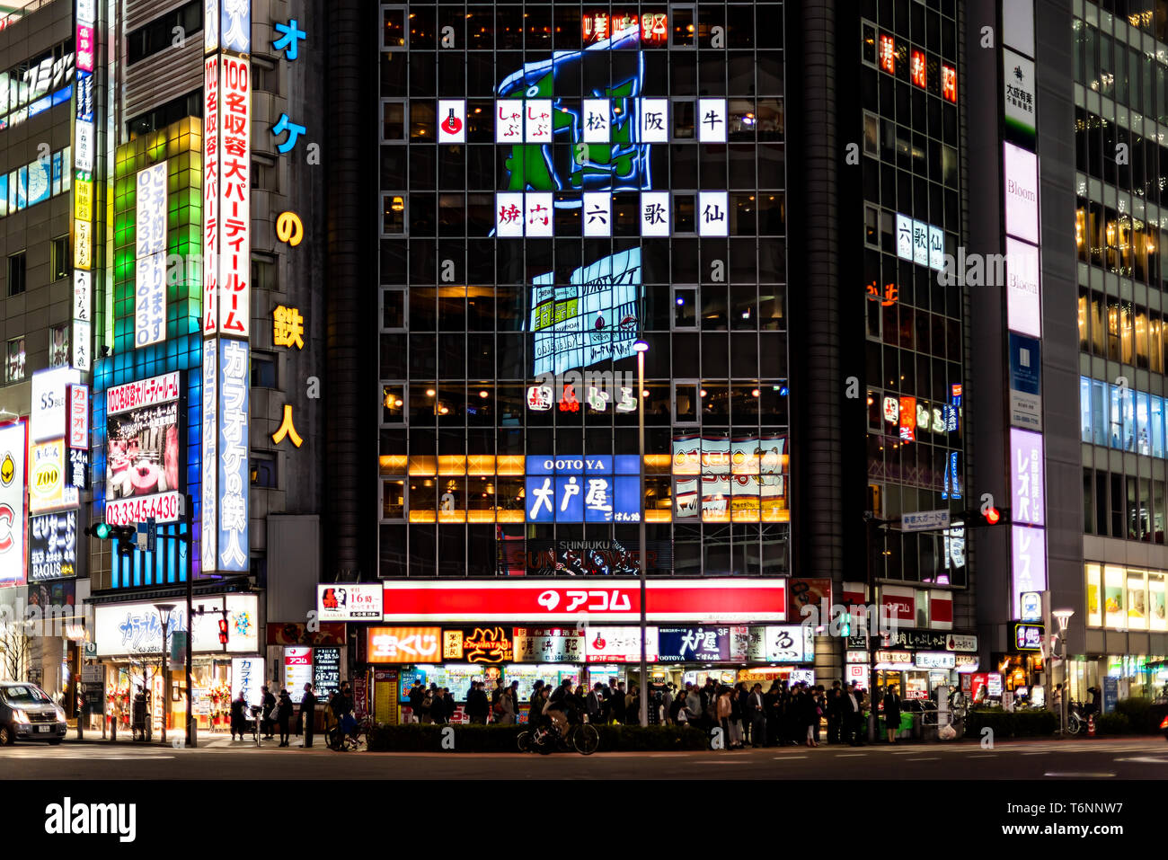 Shinjuku Japan April 3 19 People Waiting Crossing Crosswalk In Downtown City With Neon Bright Lights At Night Stock Photo Alamy