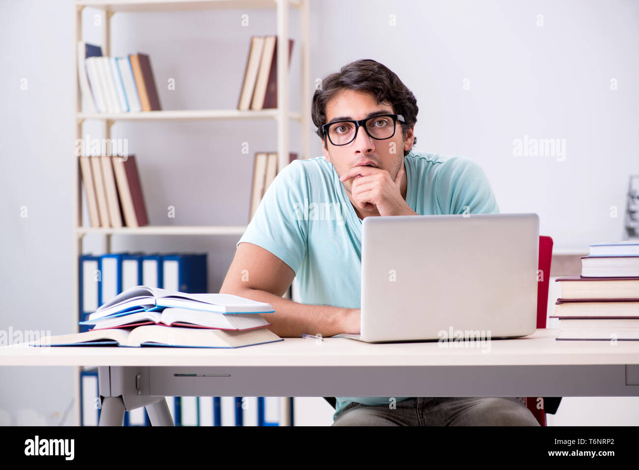 Young student in tele-learning concept Stock Photo