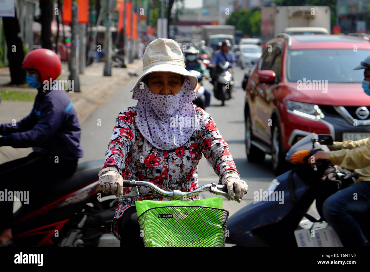 Vietnamese Woman Wear Face Mask To Sun Protection Ride Bicycle Under High Temperature In Hot Day Tired Face In Extreme Weather Vietnam Stock Photo Alamy Vietnamese Woman Wear Face Mask To Sun Protection Ride Bicycle Under High Temperature In Hot Day Tired Face In Extreme Weather Vietnam Stock Photo Alamy