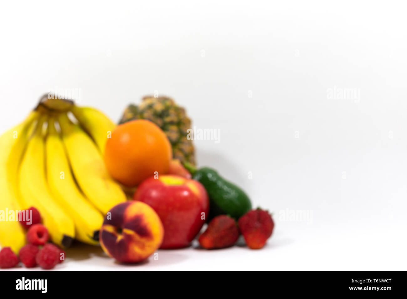 Out of focus fresh organic fruit concept, weight loss obesity, health and wellbeing. Clean eating, plant based, whole foods, vegan lifestyles Stock Photo