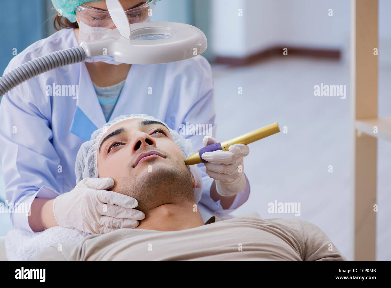 Man visiting dermatologyst for laser scar removal Stock Photo Alamy