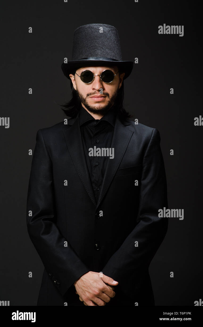 Vintage concept with man wearing black top hat Stock Photo Alamy