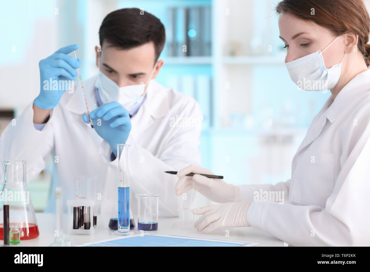 Scientists in lab examine hi-res stock photography and images - Alamy