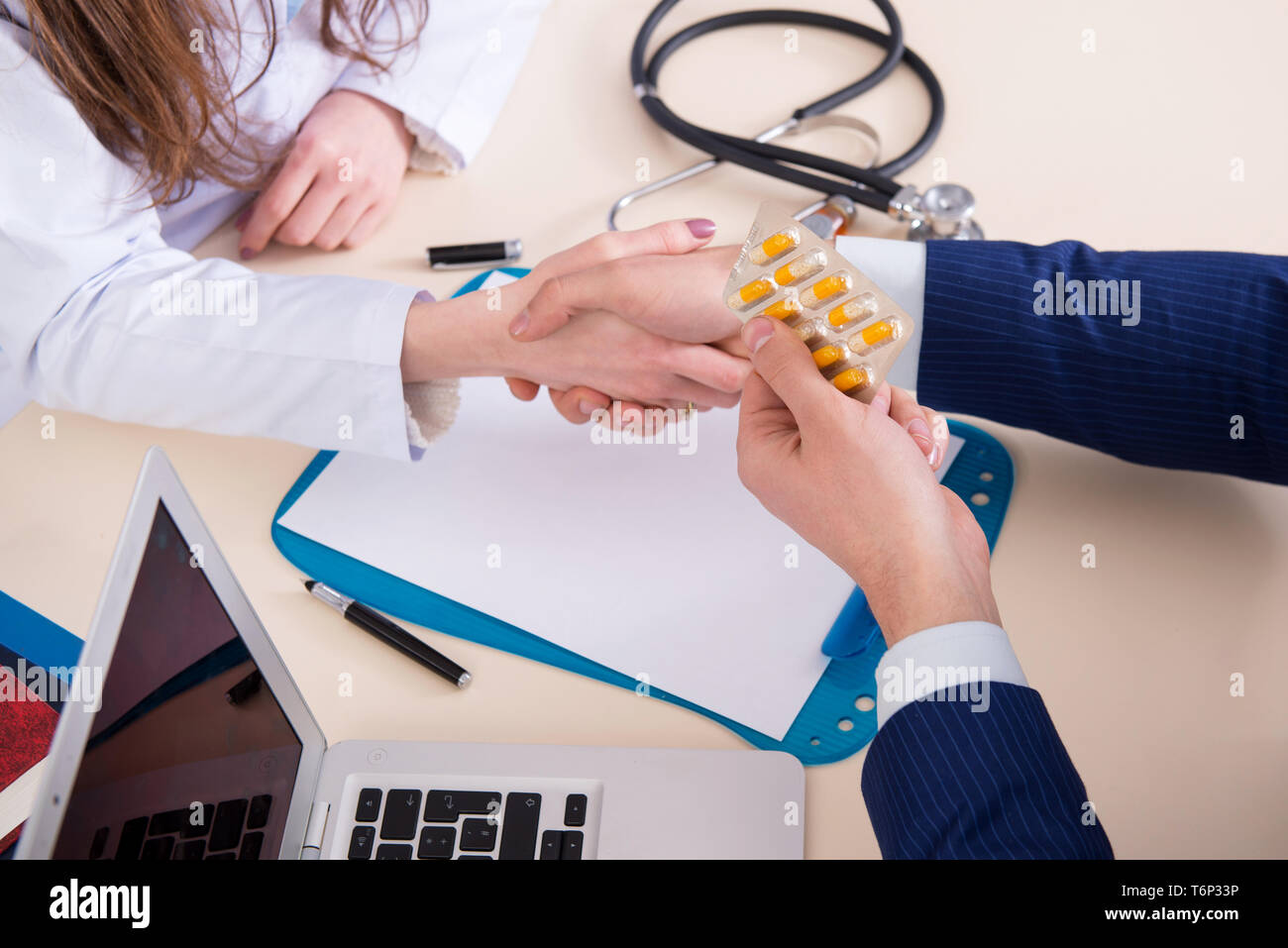 Man visiting doctor for routine check-up Stock Photo - Alamy