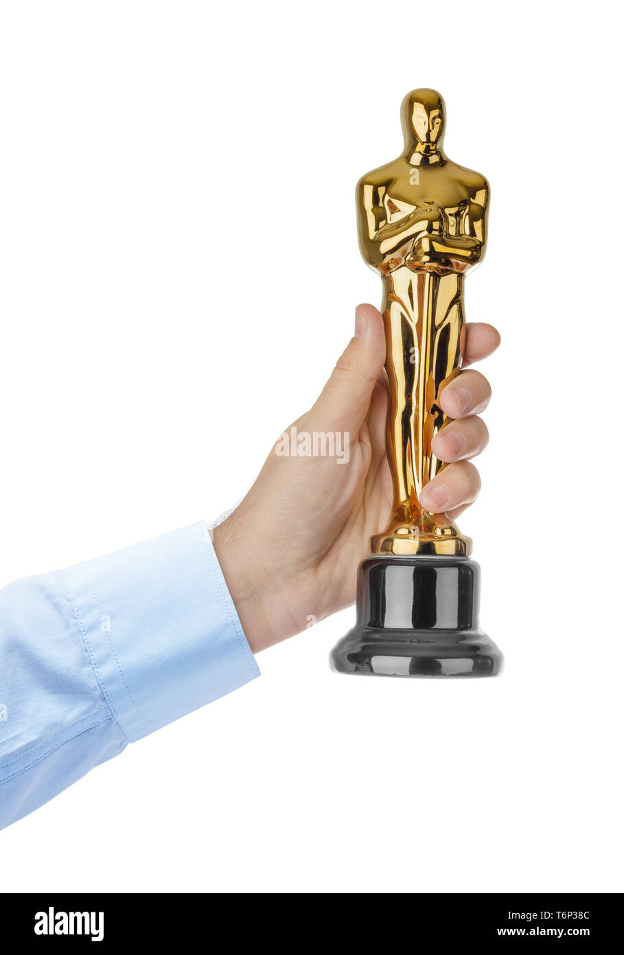 Hand with Award of Oscar ceremony Stock Photo