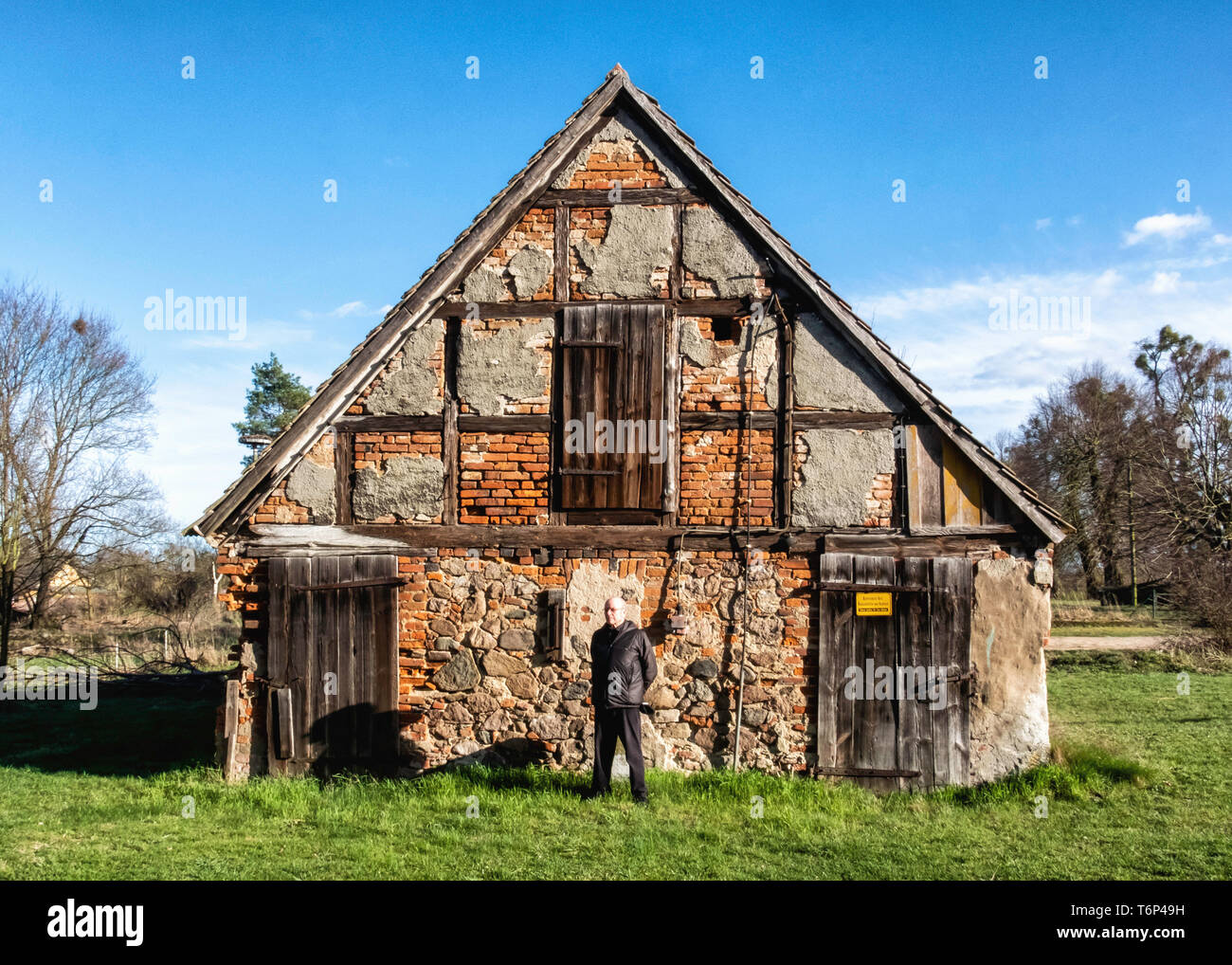 Derelict Old Barn Building With Stone Exterior And Half Timbered
