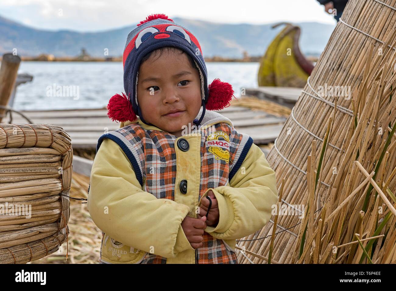 Native small child, Urus tribe, Lake Titicaca, Puno region, Peru Stock Photo