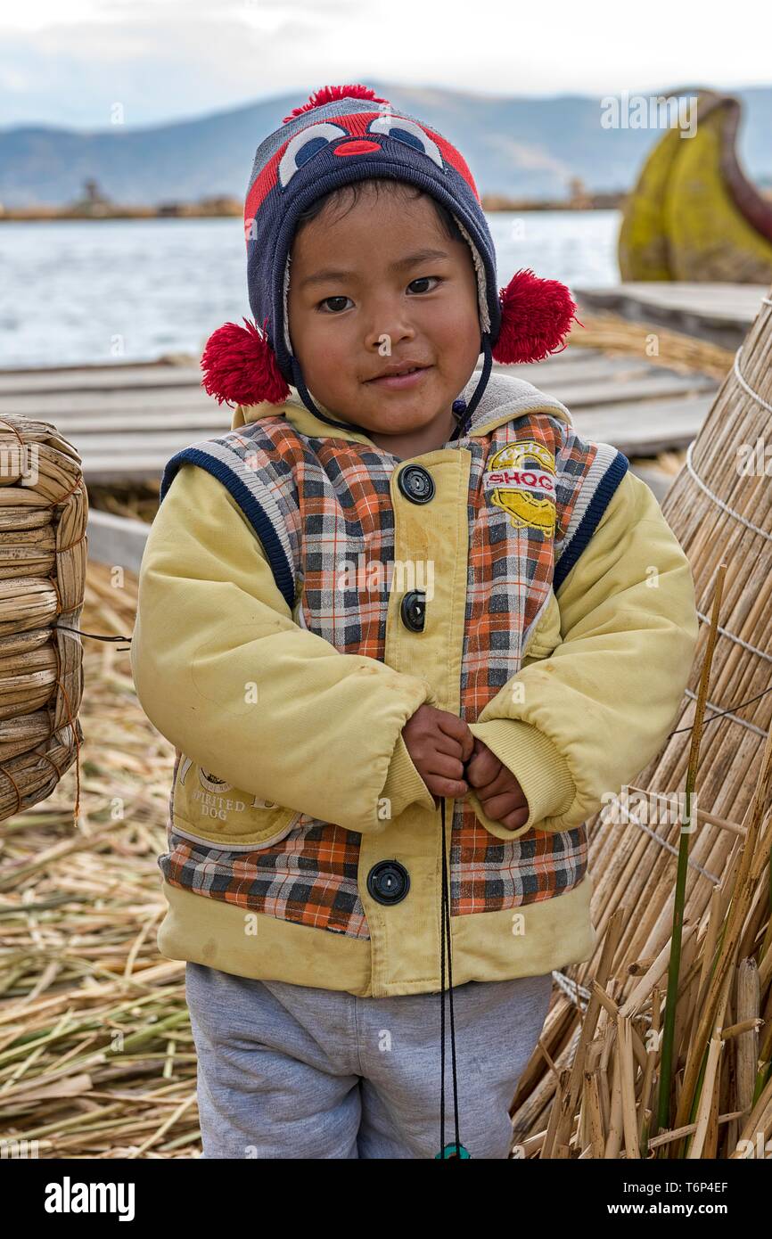 Native small child, Urus tribe, Lake Titicaca, Puno region, Peru Stock Photo