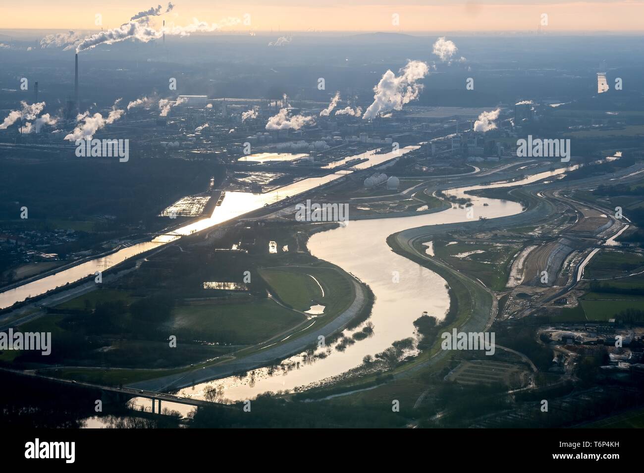 Aerial view, river Lippe and Wesel-Datteln canal with smoking chimneys against the light, industrial area, Sickingmuhle, North Rhine-Westphalia Stock Photo