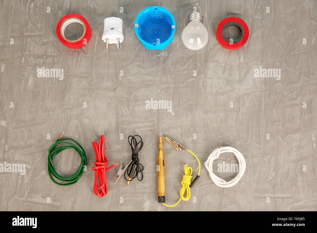 Flat lay composition with electrical tools on grey background Stock Photo