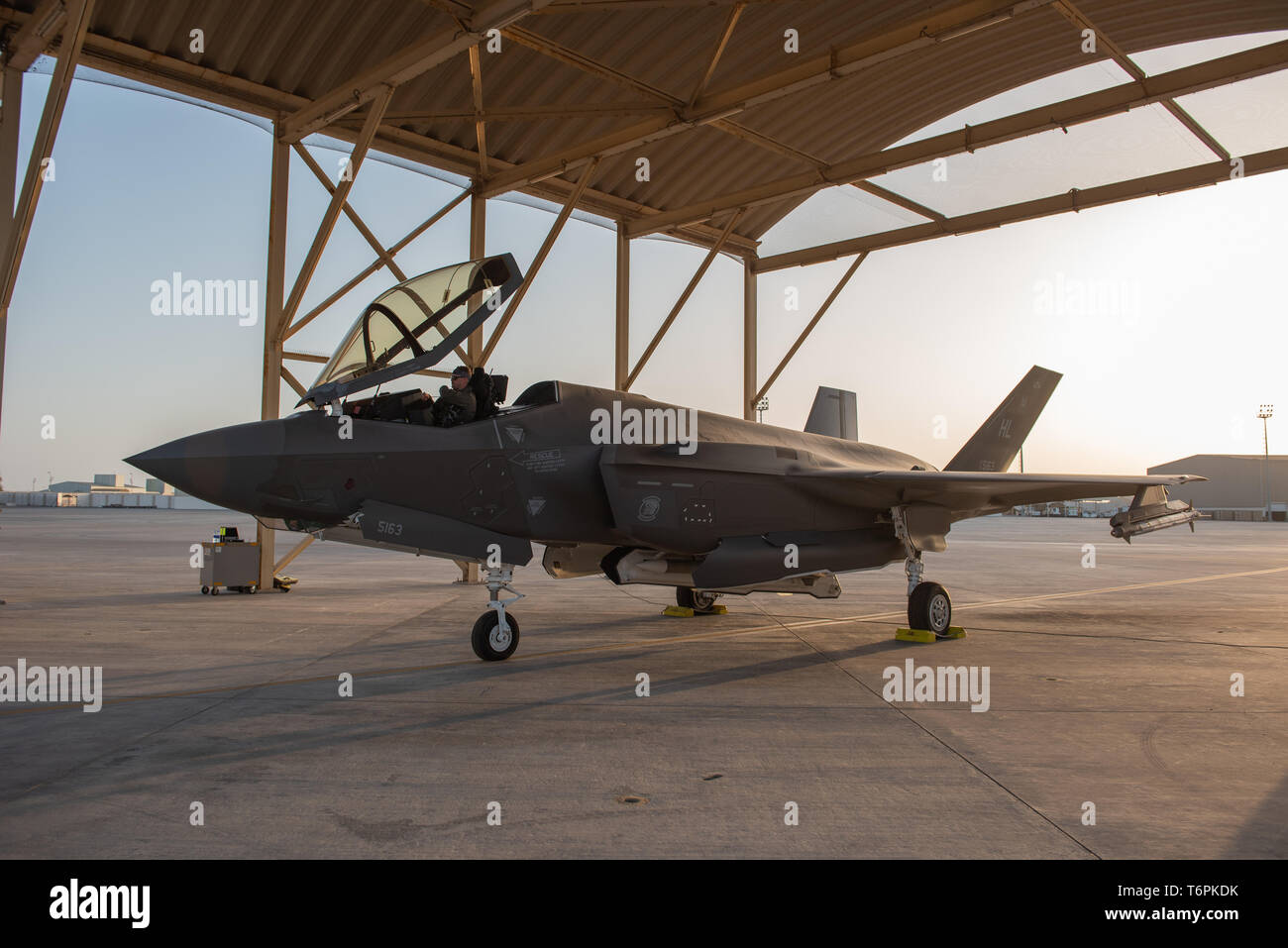 A 4th Expeditionary Fighter Squadron F-35A Lightning II pilot sits in his aircraft before a mission April 26, 2019, at Al Dhafra Air Base, United Arab Emirates. The stealth fighter brings the most modern technology to the U.S. Air Force’s inventory. (U.S. Air Force photo by Staff Sgt. Chris Thornbury) Stock Photo