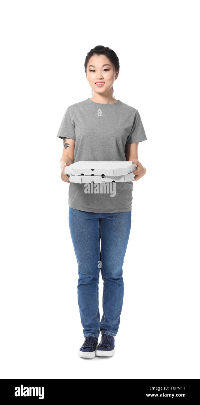 Asian woman with cardboard pizza boxes on white background. Food delivery service Stock Photo