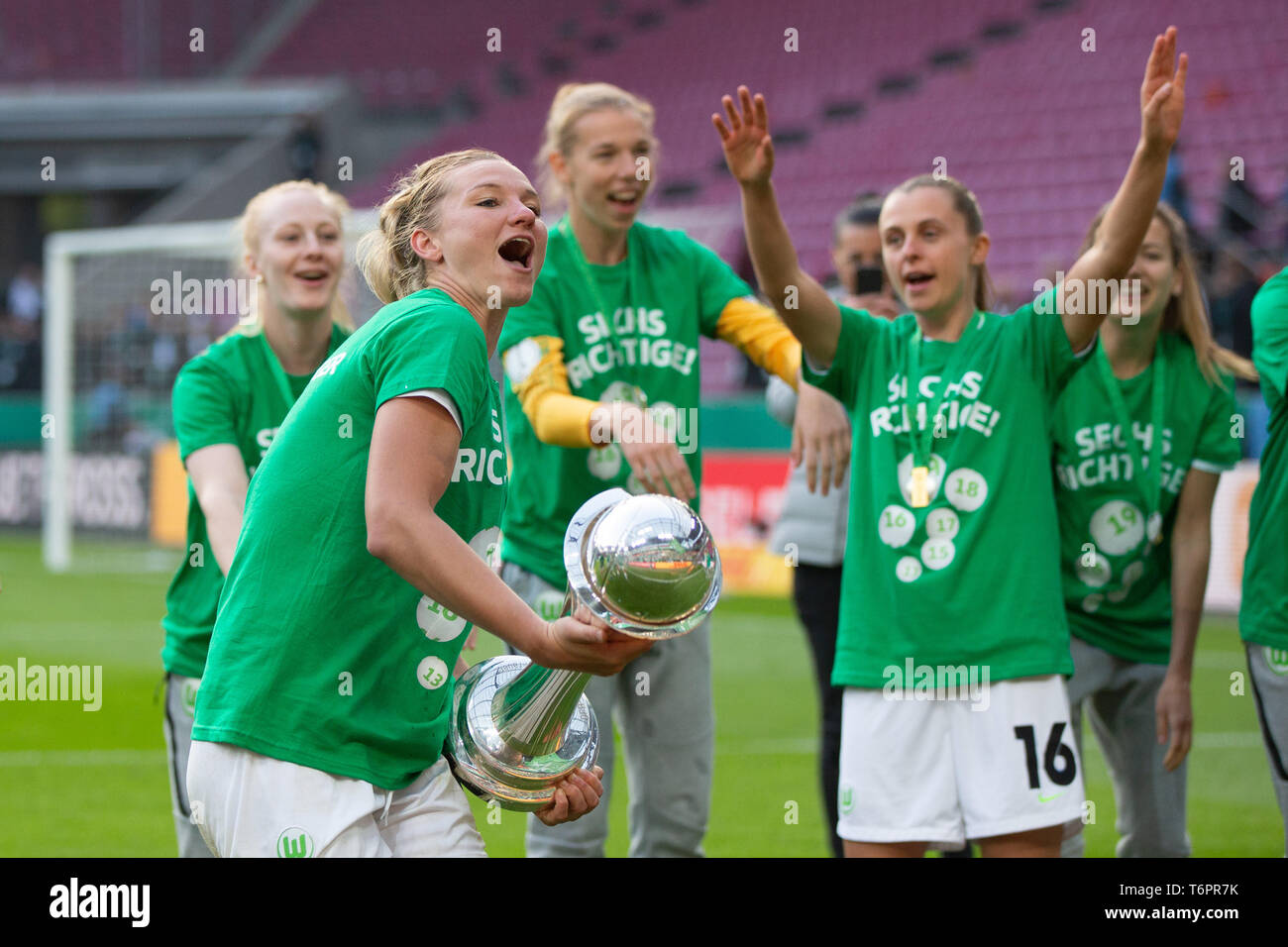 Cologne, Germany May1 2019, women football cup final, VFL Wolfsburg vs SC Freiburg: Alexandra Popp (Wolfsburg) lifts the trophy.   DFB REGULATIONS PRO Stock Photo