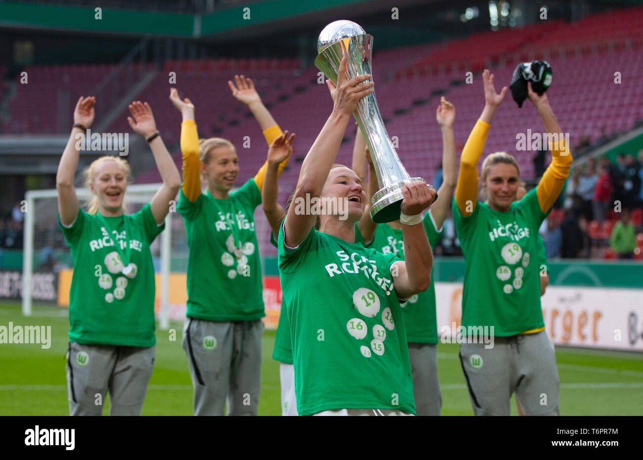 Cologne, Germany May1 2019, women football cup final, VFL Wolfsburg vs SC Freiburg: Alexandra Popp (Wolfsburg) lifts the trophy.   DFB REGULATIONS PRO Stock Photo