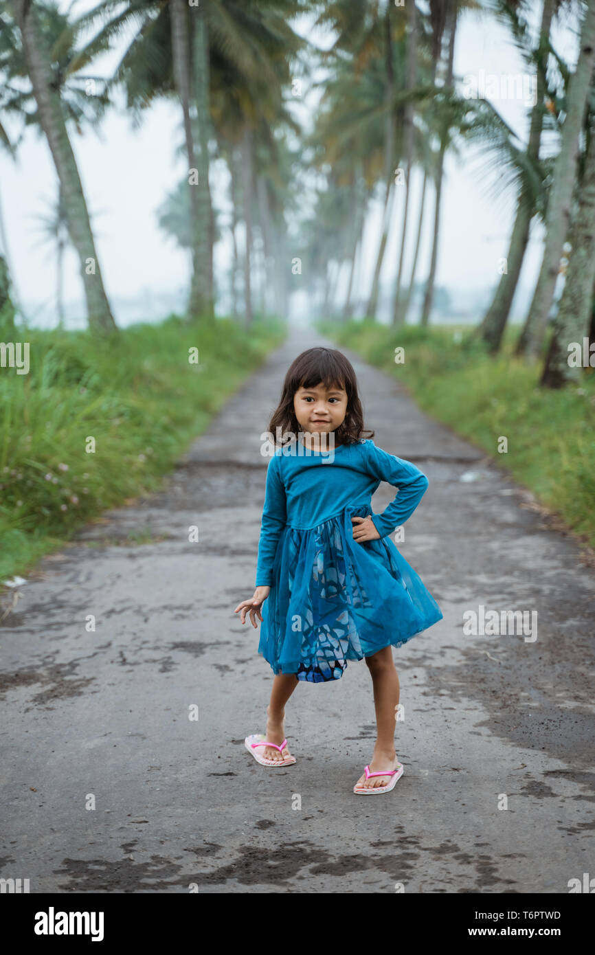 Image of Small girl in pose, model, Asian, Indian focus,  smiling-TI182363-Picxy