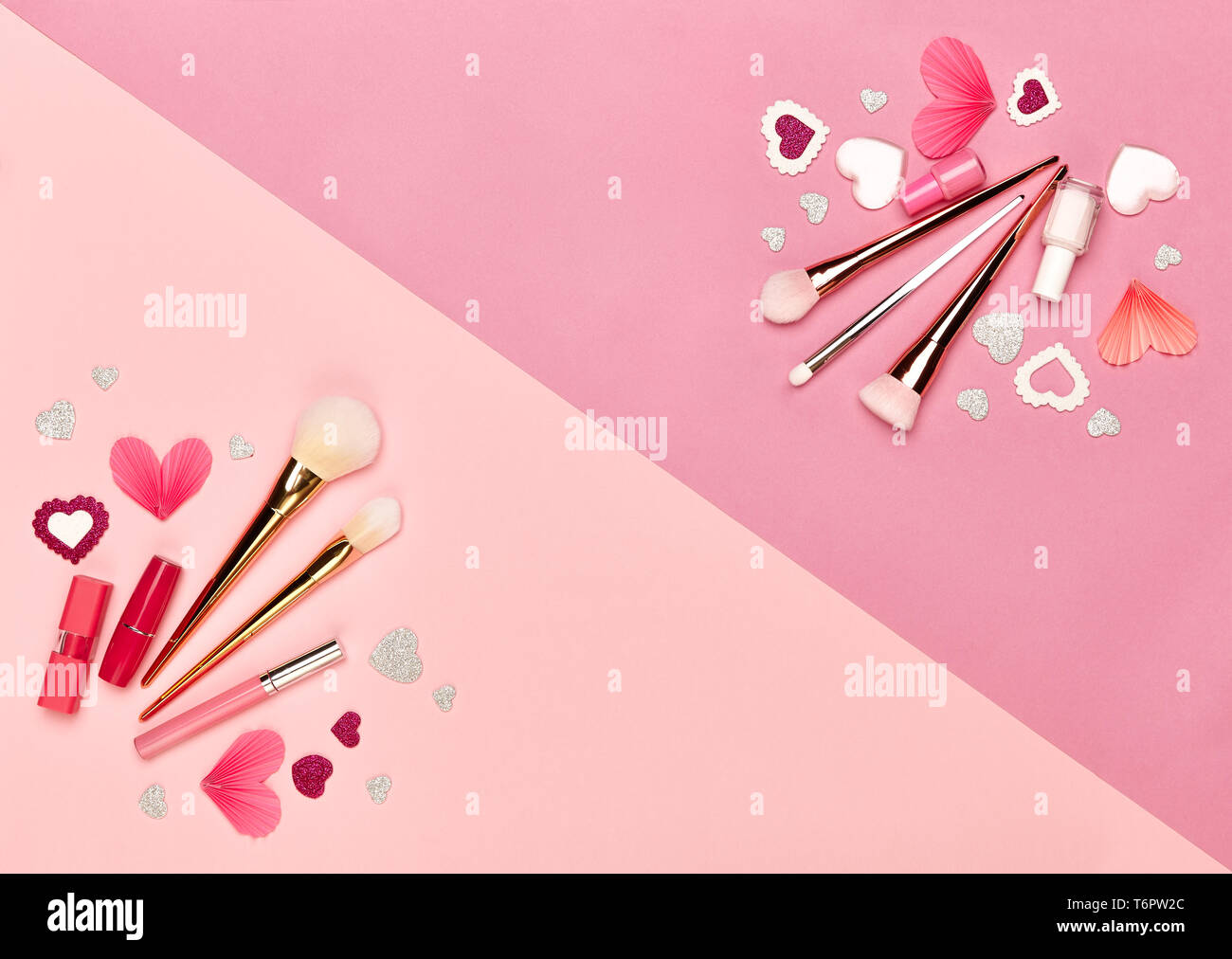 Valentine's Day Background. Red Hearts on a Pink background. Flat Lay. St. Valentine's Day Wallpaper. Make Up Brushes. Lipstick and nail Polish Stock  Photo - Alamy