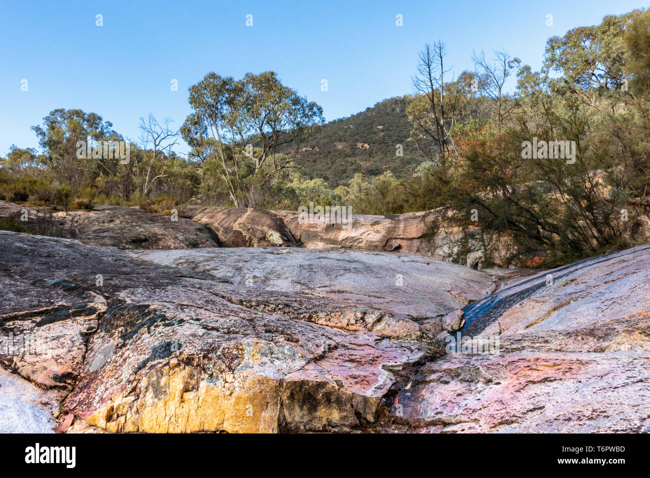 Mineral discolouration at a dried waterfall at Cypress Pine Lookout at Namadgi National Park, Canberra, Australia on a morning in April 2019 Stock Photo
