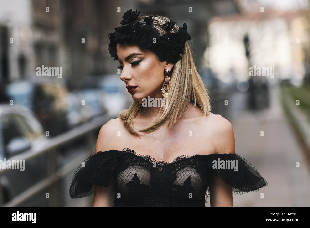 Street style detail earrings hi-res stock photography and images - Alamy