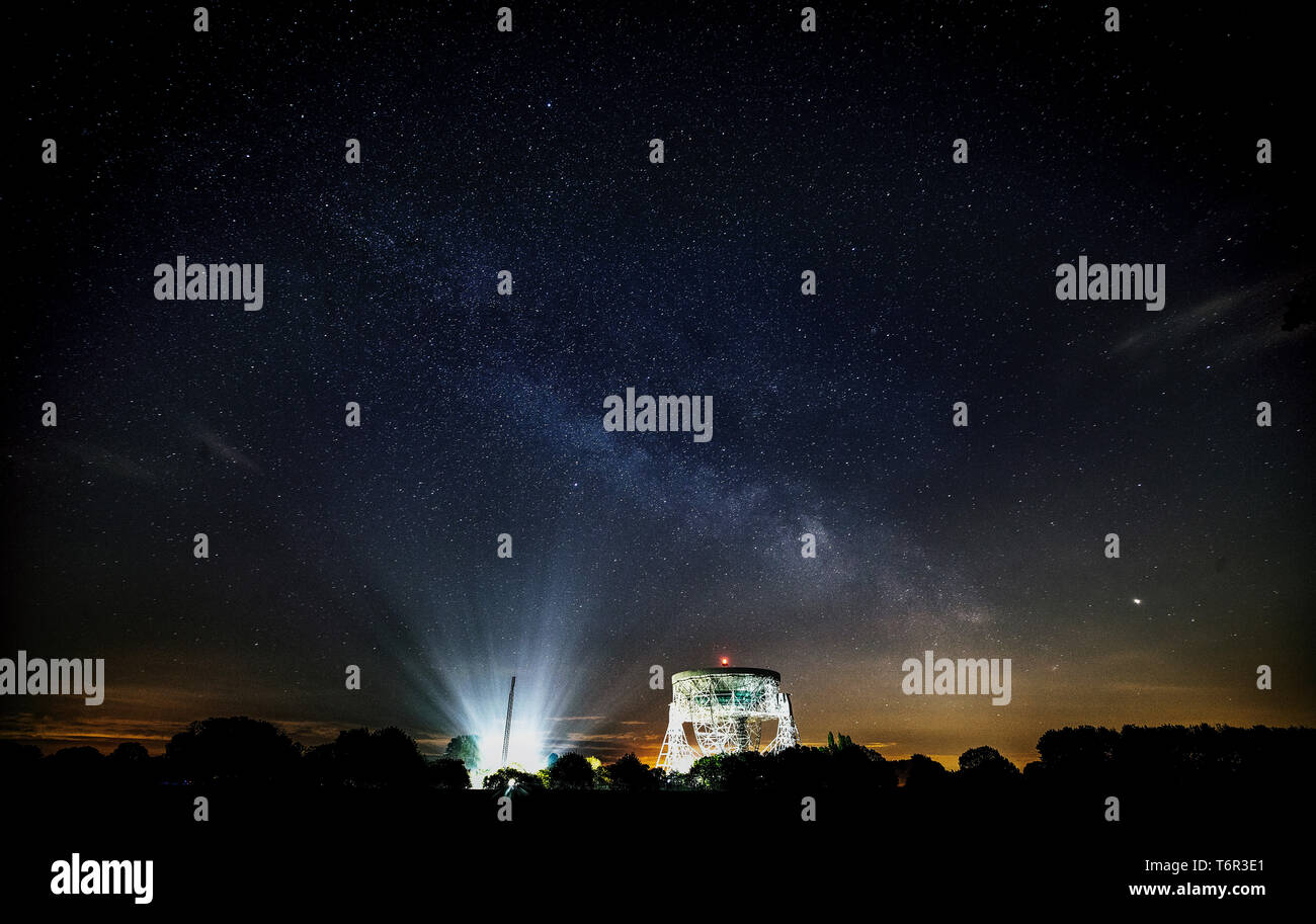 Shooting stars and the Milky Way are seen over the Lovell Telescope at Jodrell Bank Observatory in Cheshire. Stock Photo