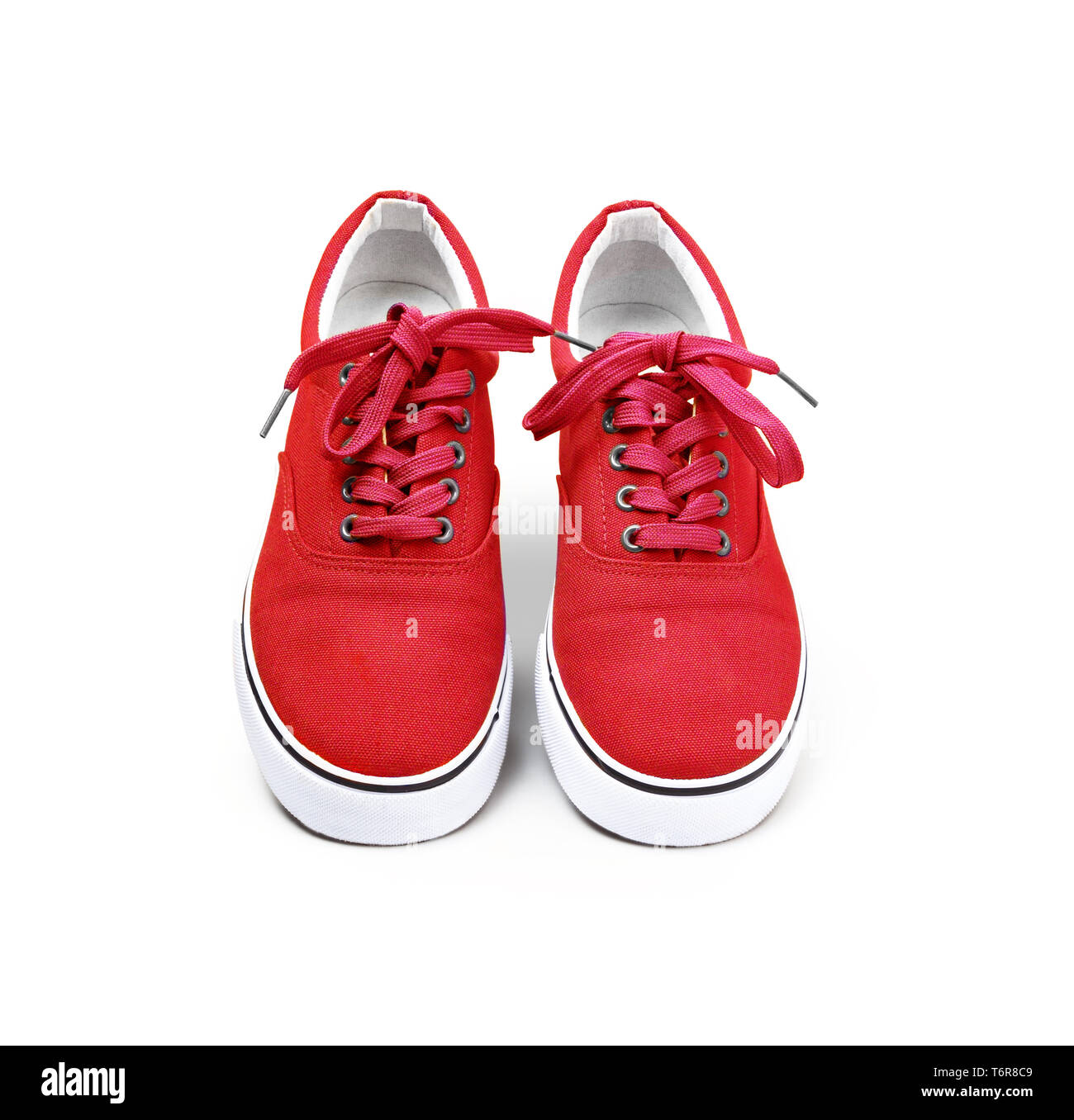 red and white canvas shoes