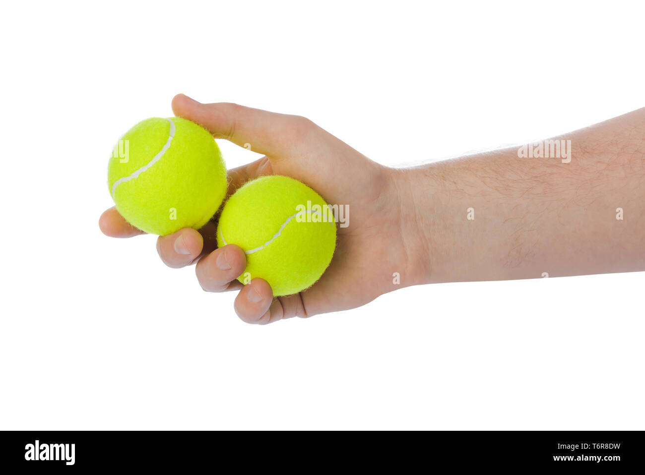 Hand with tennis balls Stock Photo Alamy