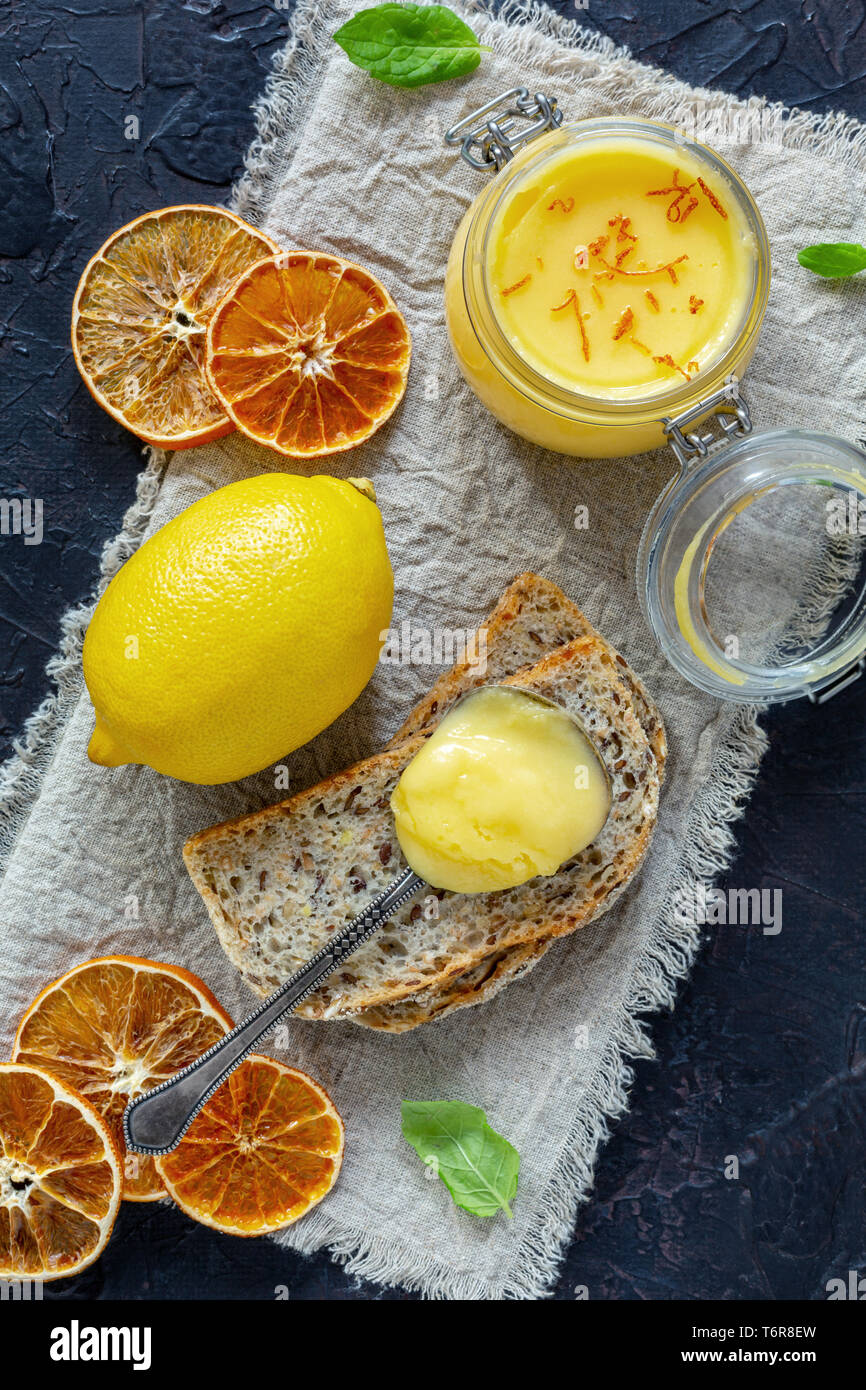 homemade lemon curd in a jar. delicious lemon cream or jam for a