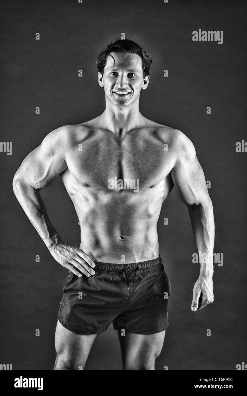 Attractive guy muscular chest. Proud of excellent shape. Man muscular  athlete stand confidently. Healthy and strong. Muscular bodybuilder concept.  Improve yourself. Macho handsome with muscular torso Stock Photo - Alamy