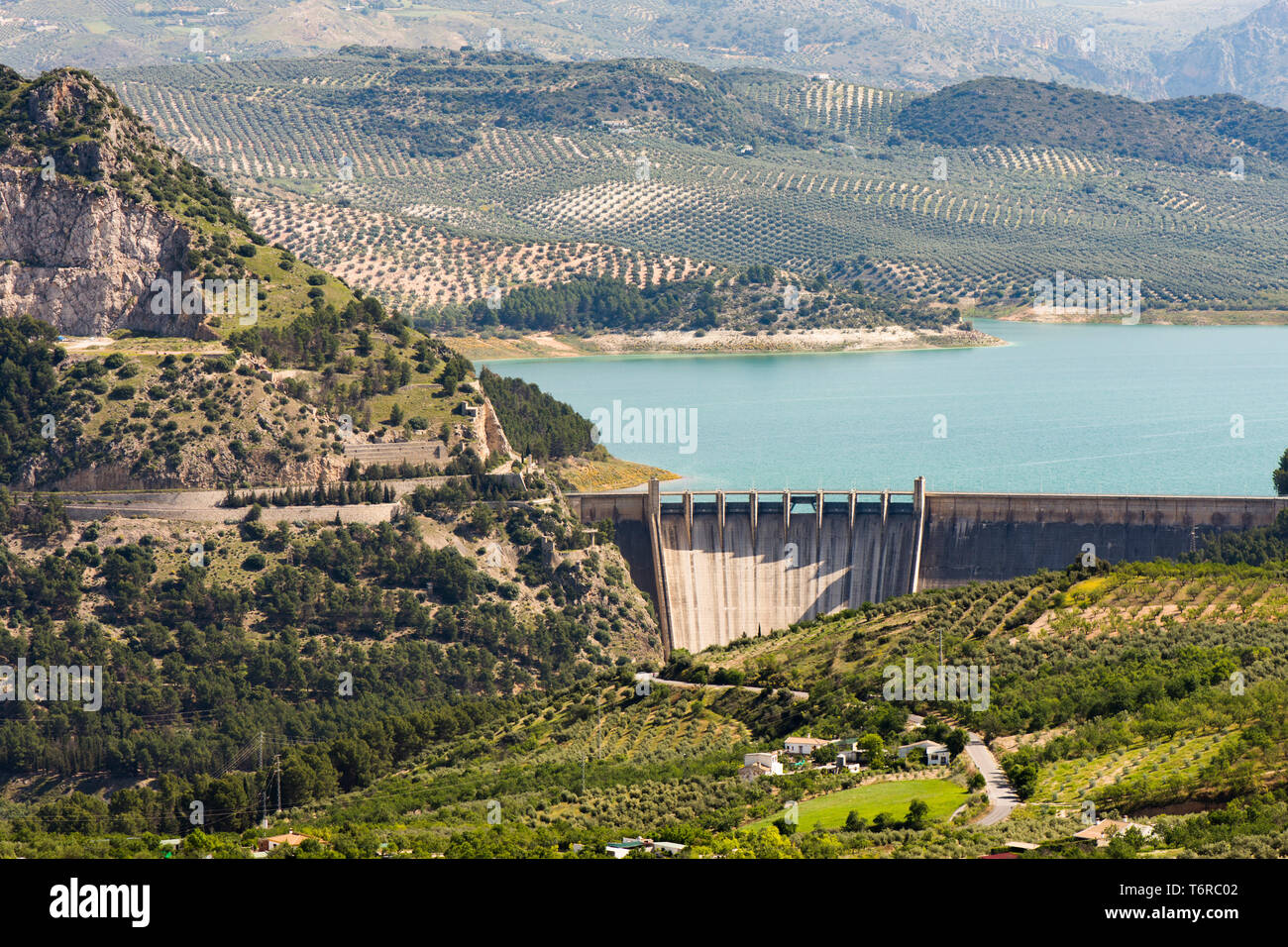 Dam at Iznajar Reservoir, of Geníl river, providing electricity, Cordoba province, Spain. Stock Photo