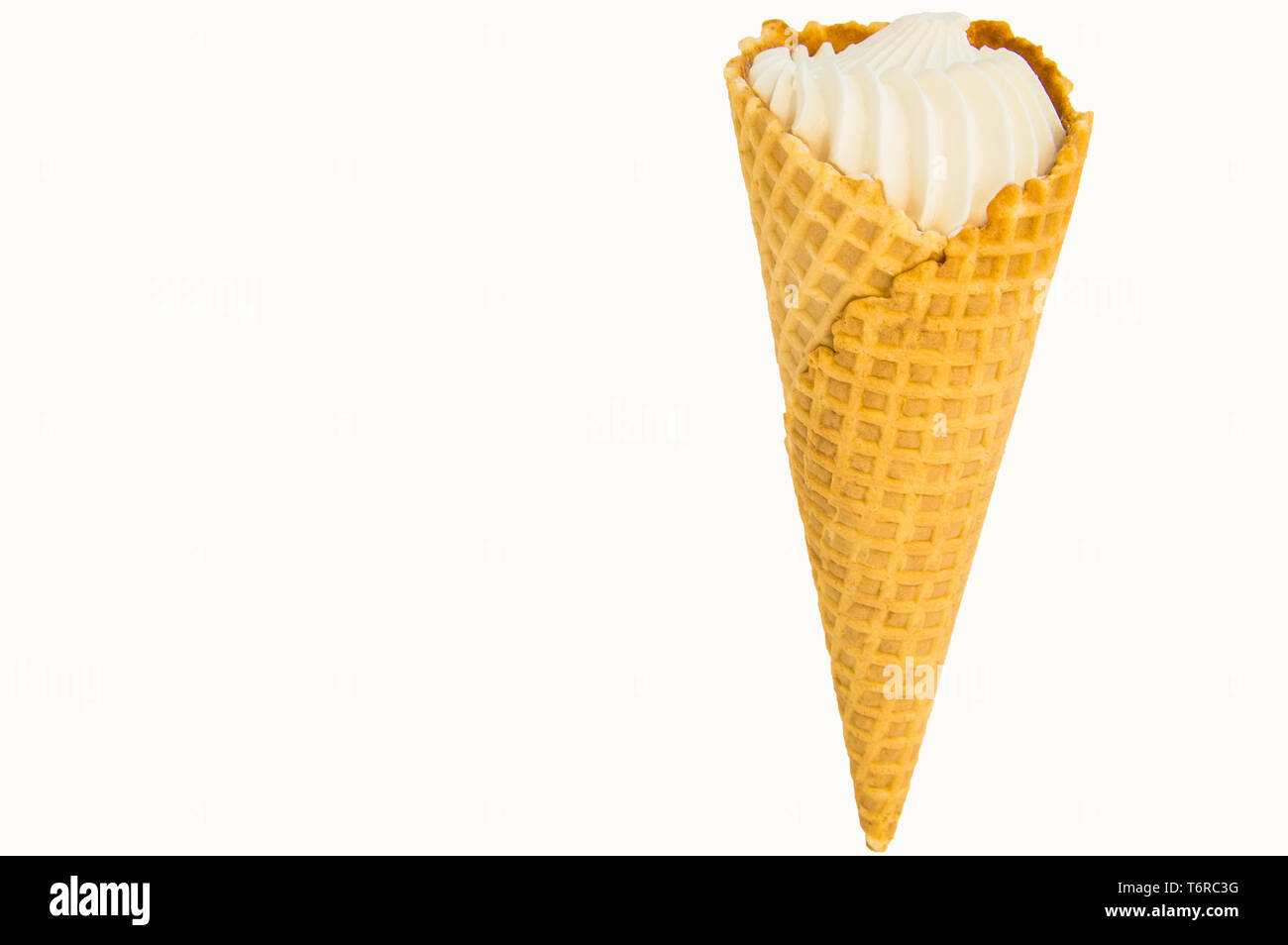 Waffle vanilla ice cream cone isolated on white background by clipping ...