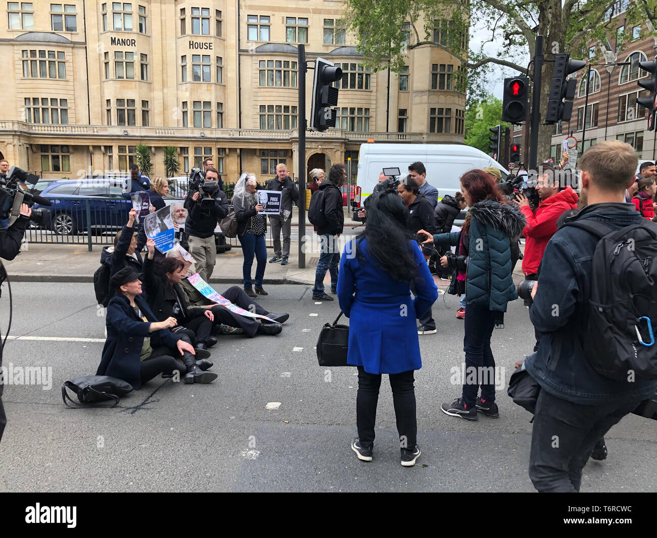 Protesters gather outside Westminster Magistrates' Court during Julian Assange's extradition hearing took place inside the building, where Assange appeared via videolink from Belmarsh Prison. Stock Photo