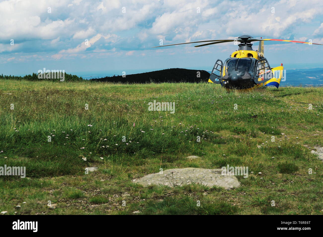 Cloudy sky with a helicopter hi-res stock photography and images - Alamy
