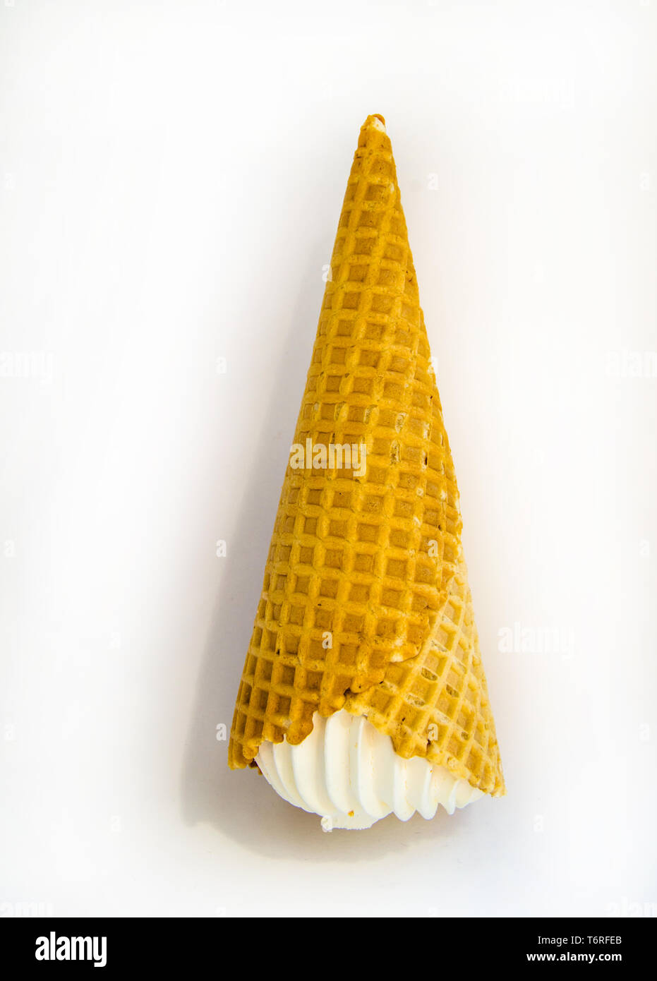 Ice cream cone fell upside down on white background, upside down object