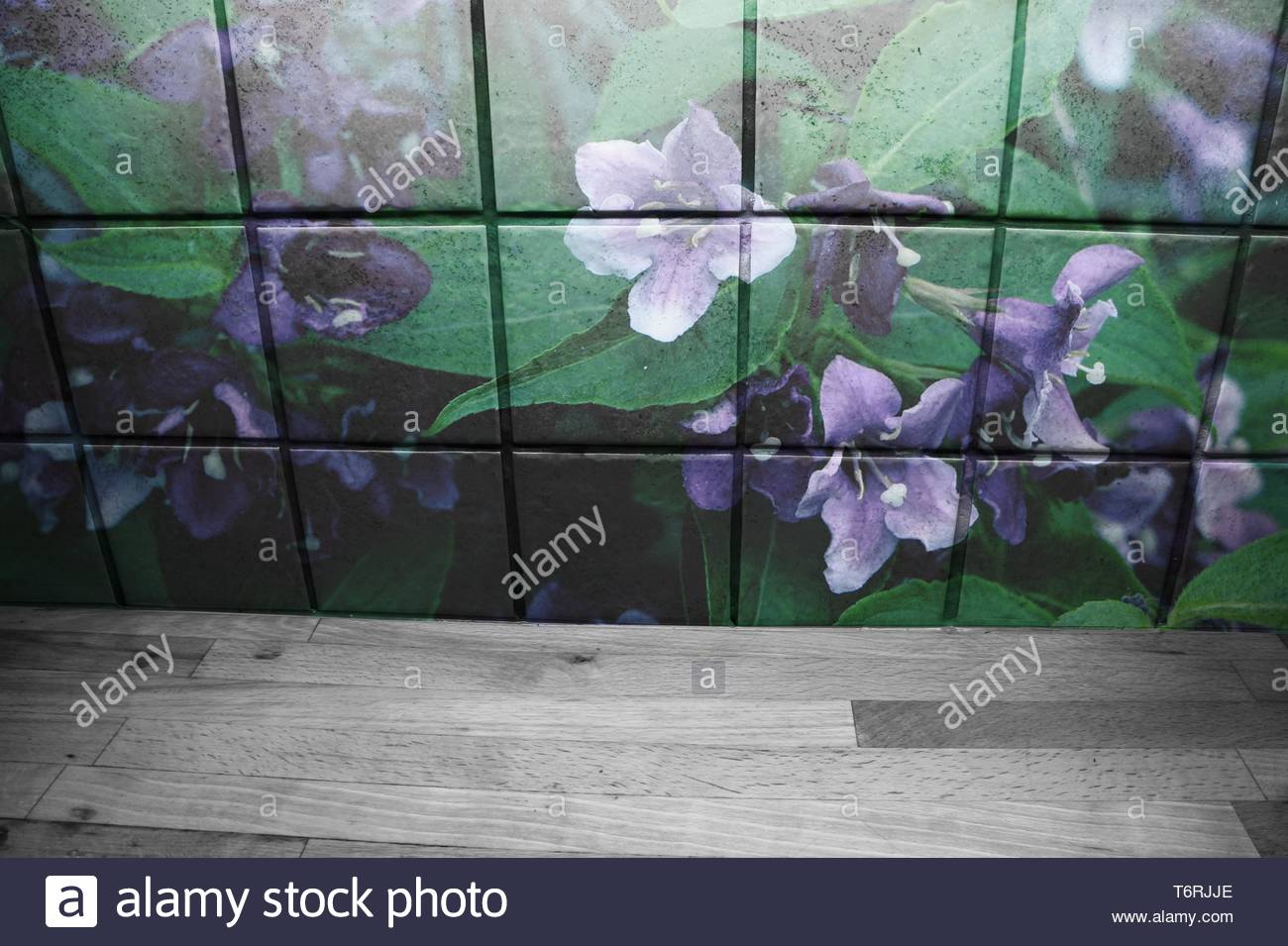 Wooden Countertop In Front Of Kitchen Tiles With Purple Flowers
