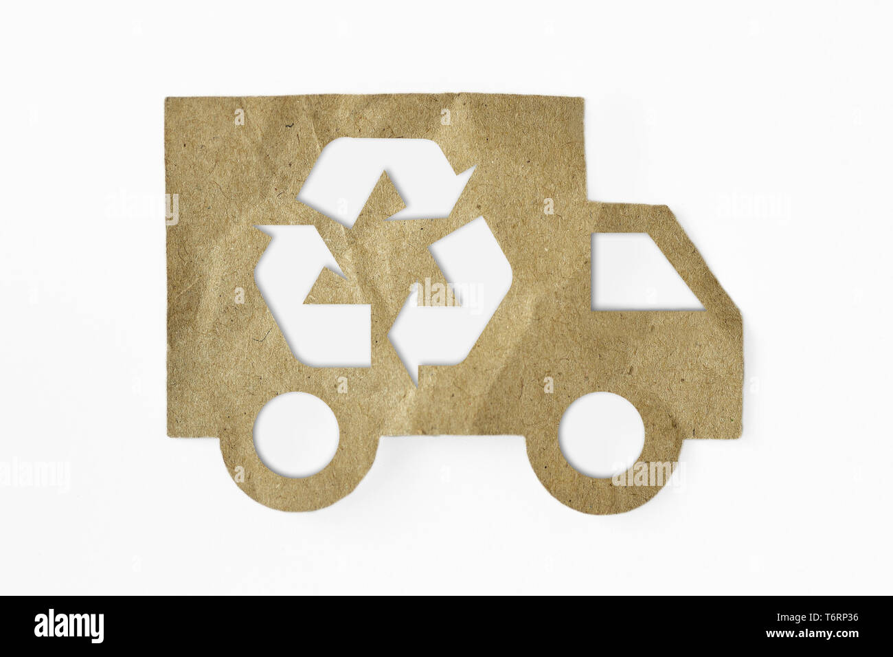 Recycled paper cut of truck with recycling symbol on white background - Green transportation concept Stock Photo