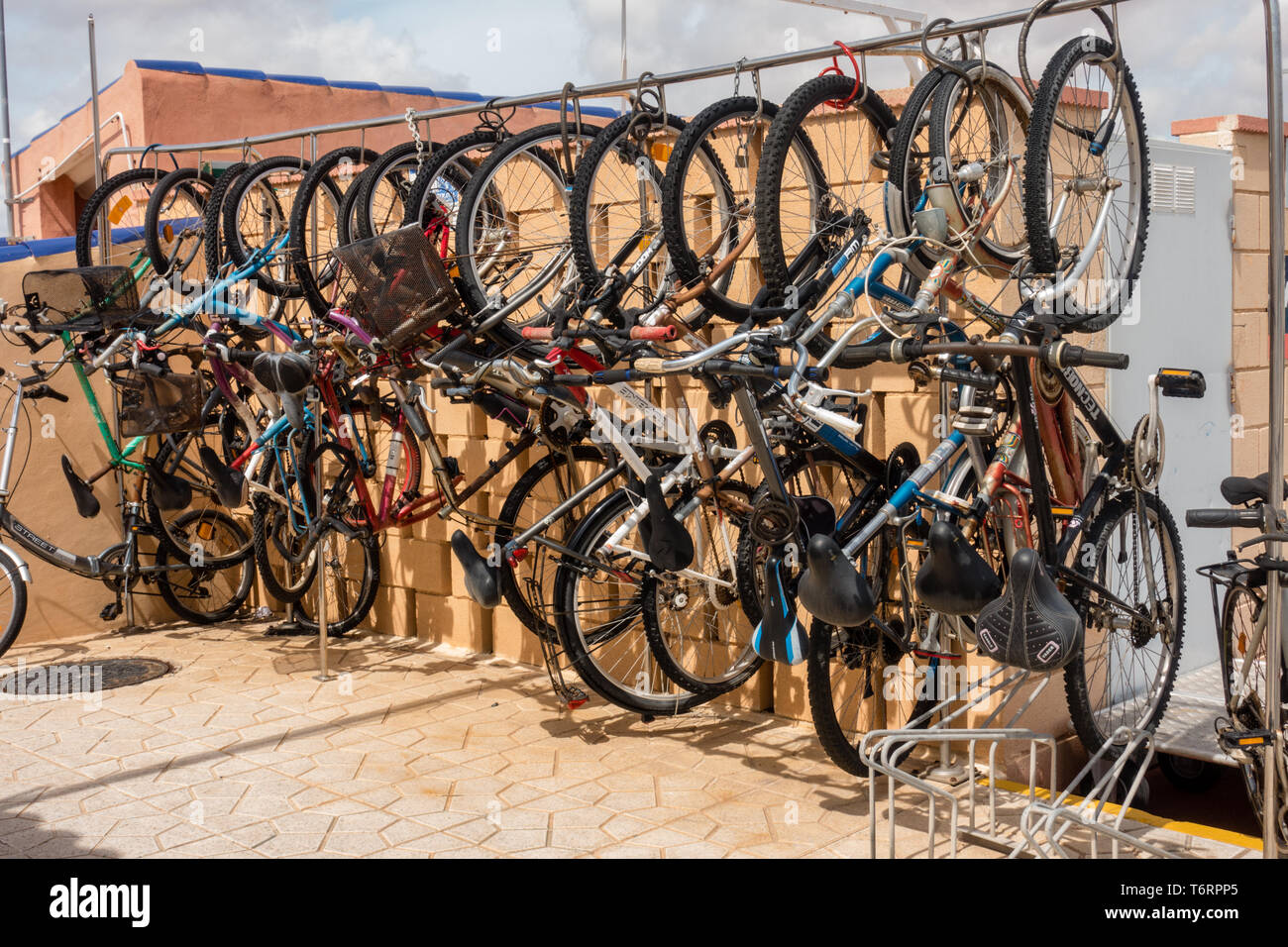Bike rack full of bikes Stock Photo