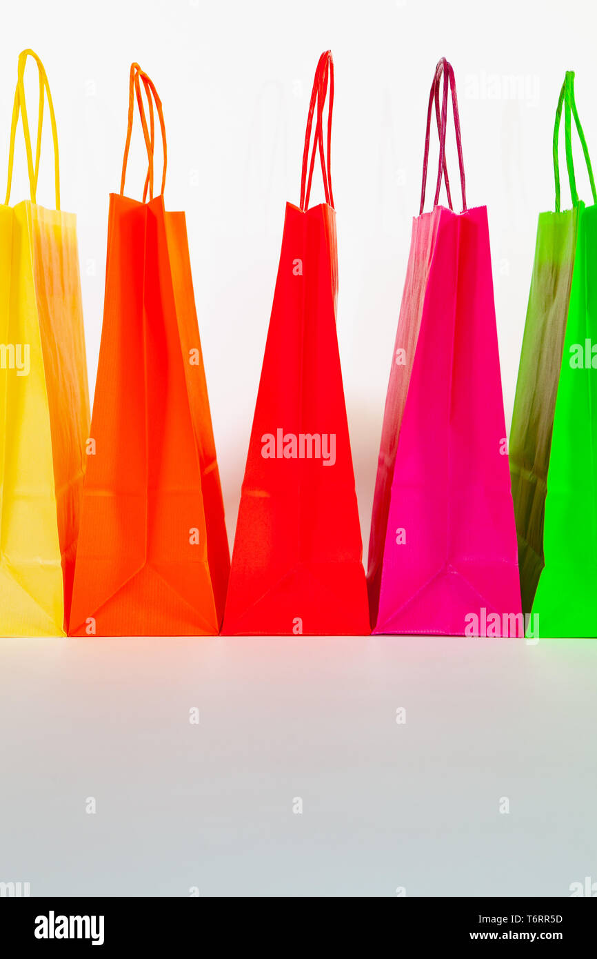 Set of colorful empty shopping bags isolated on the white background ...