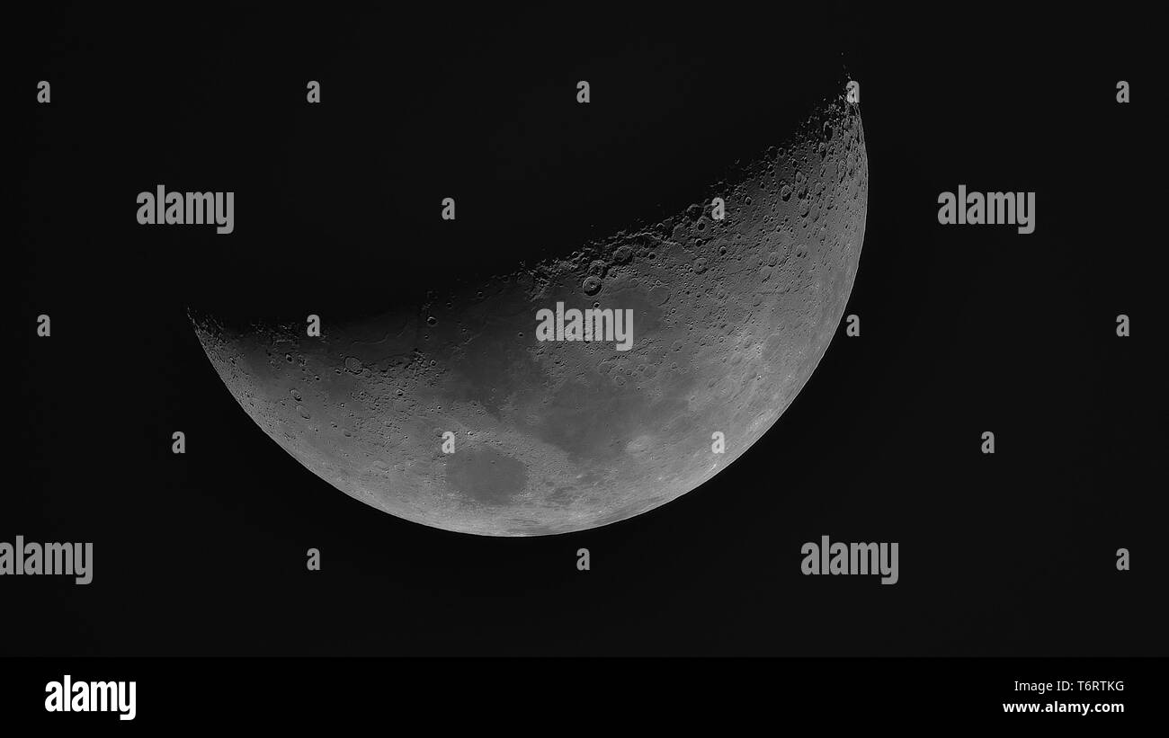 View of the Moon through telescope Stock Photo Alamy