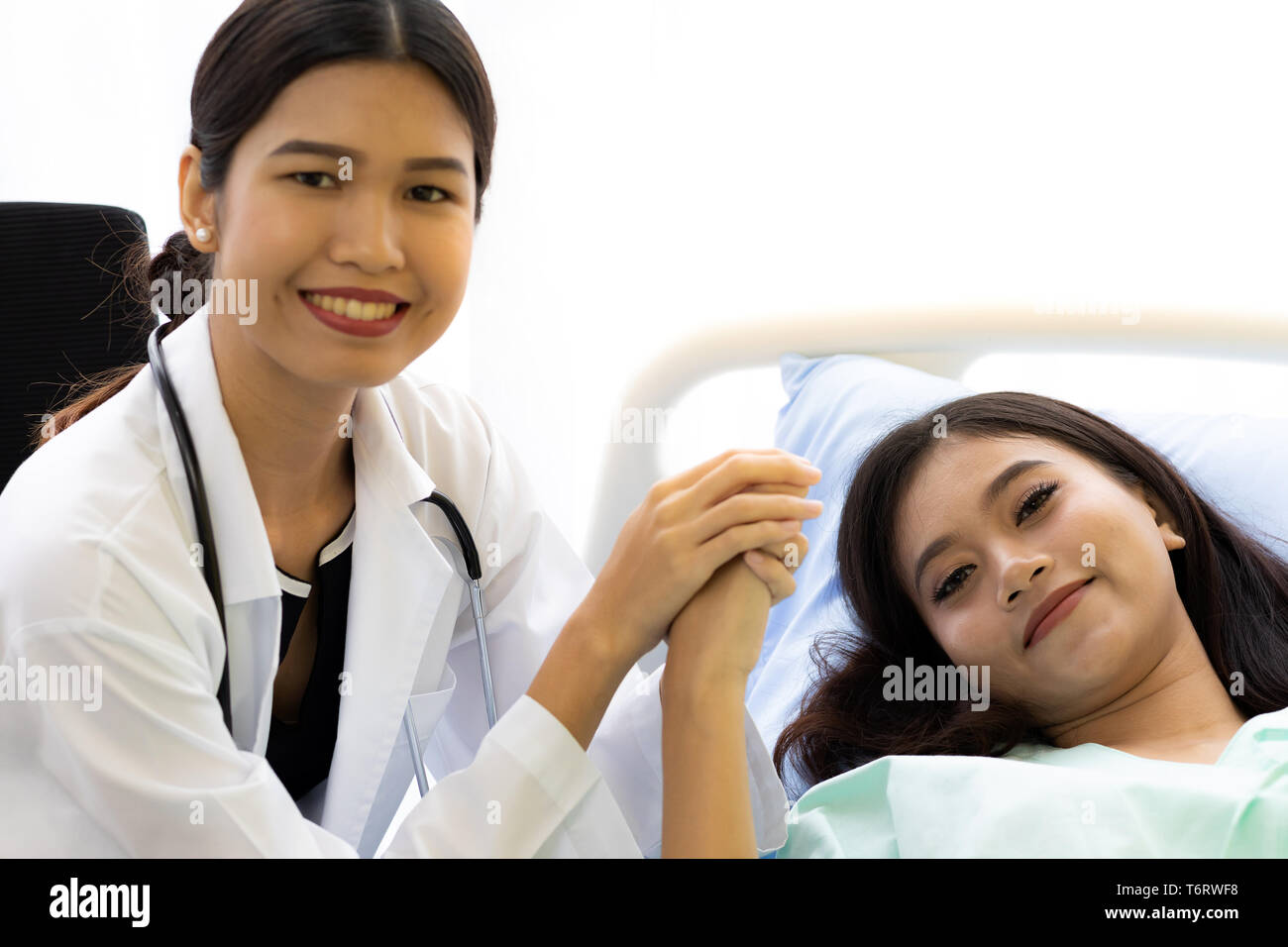 medical doctor hold patient hand Stock Photo Alamy