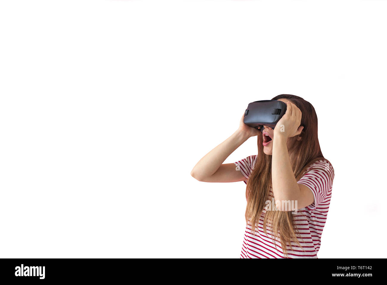 The woman with glasses of virtual reality on a white background. Future technology concept. Modern imaging technology. Stock Photo