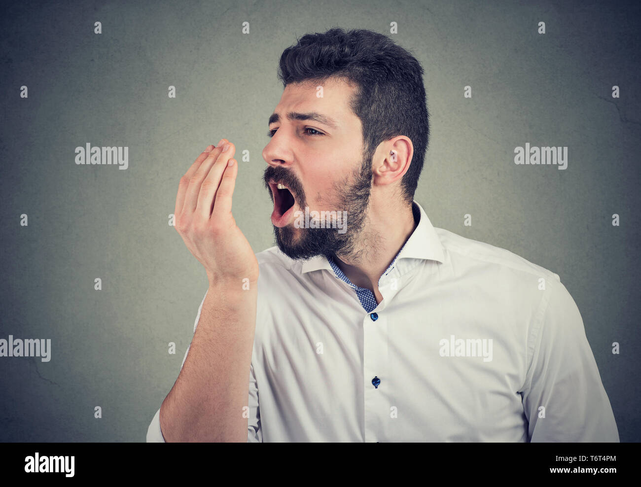 Beard man doing a hand breath test Stock Photo