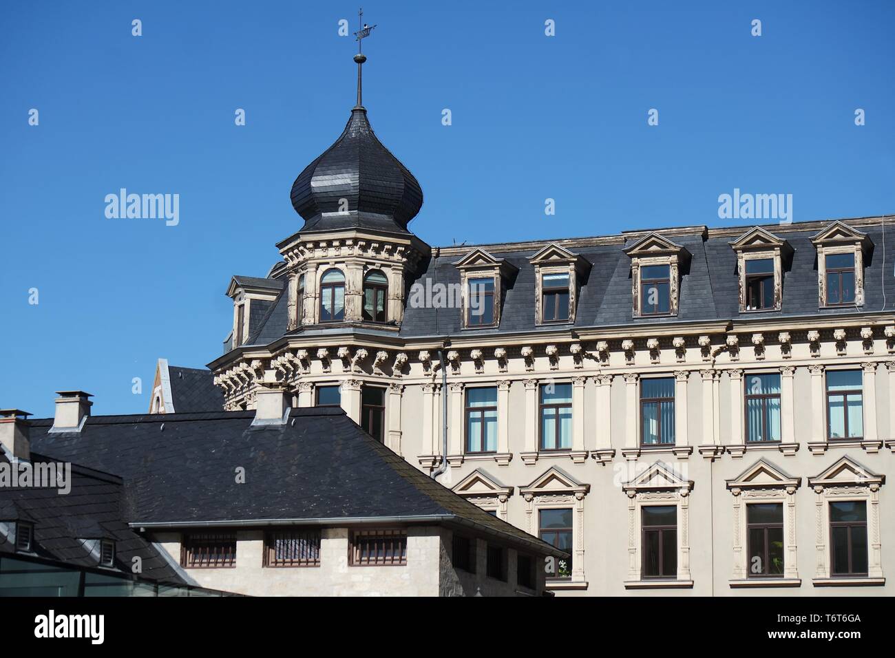 House with slate roof and onion dome Stock Photo