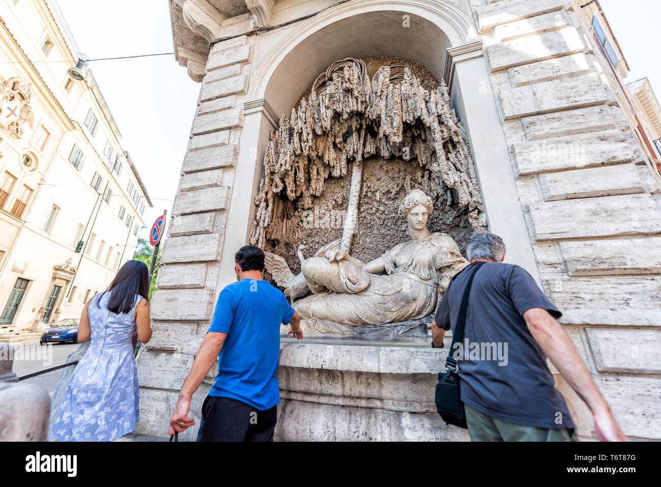 Rome, Italy - September 5, 2018: People on street in historic city by water fountain called Crossing of Quattro Fontane Incrocio delle Stock Photo