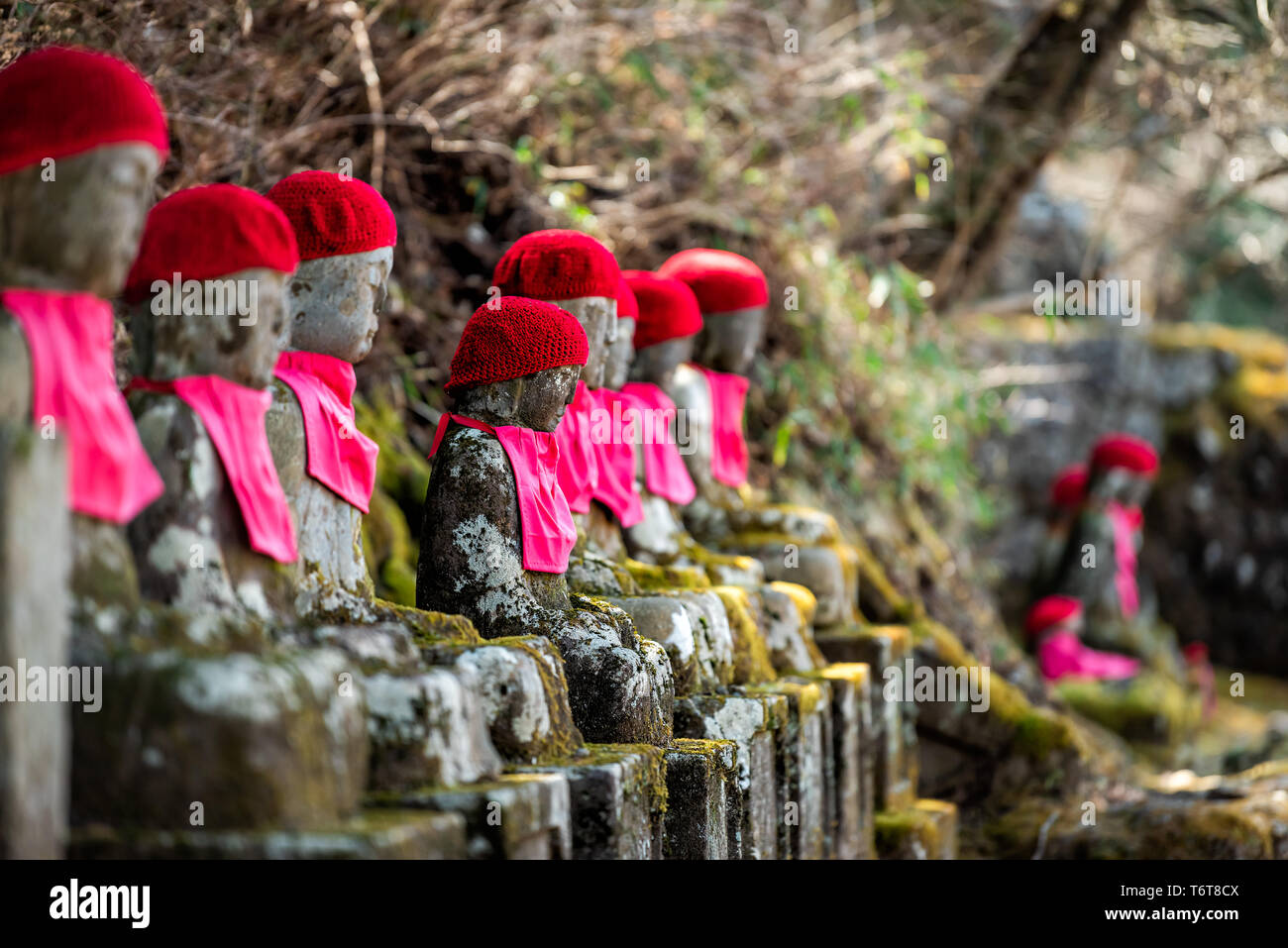 Famous red Jizo statues in Kanmangafuchi Abyss, Nikko, Tochigi in Japan