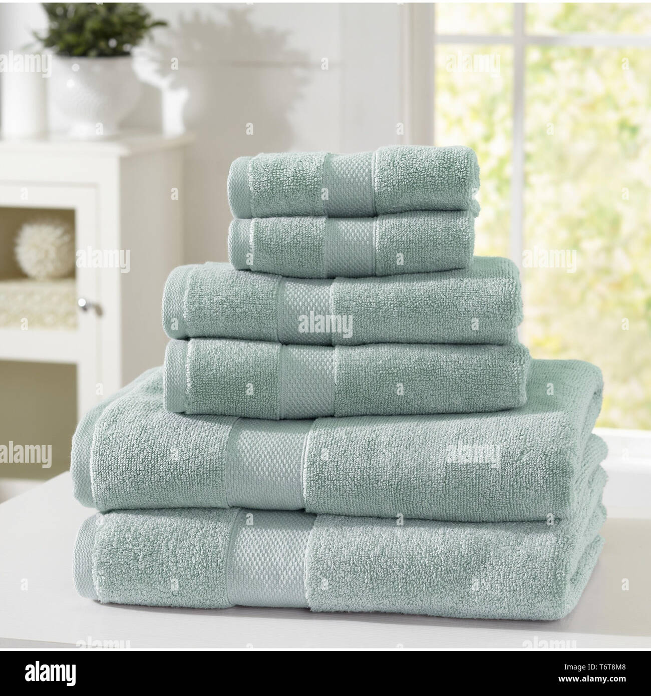 Beautiful, fluffy dobby border cotton towel set Stock Photo Alamy