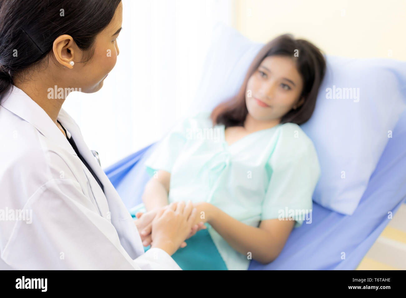 medical doctor hold patient hand Stock Photo Alamy
