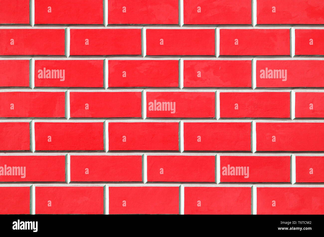 Brick wall background - new bricks wall pattern. Texture brick wall of red  color Stock Photo - Alamy