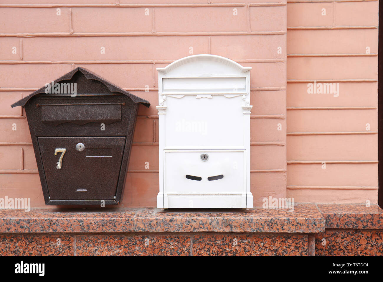 Different mailboxes on brick wall of building outdoors Stock Photo Alamy