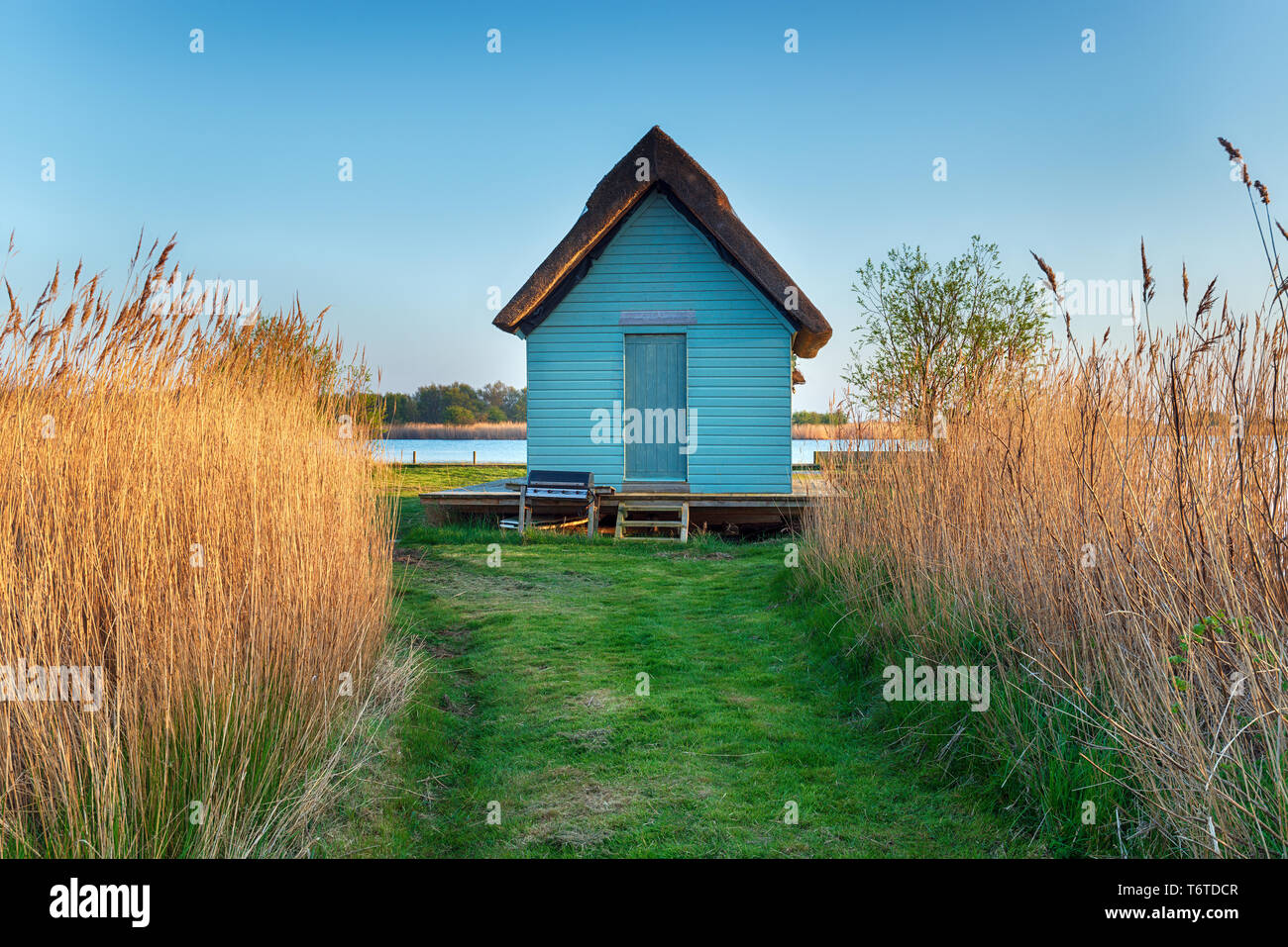 A boat house in the reeds near Horsey on the Norfolk Broads Stock Photo