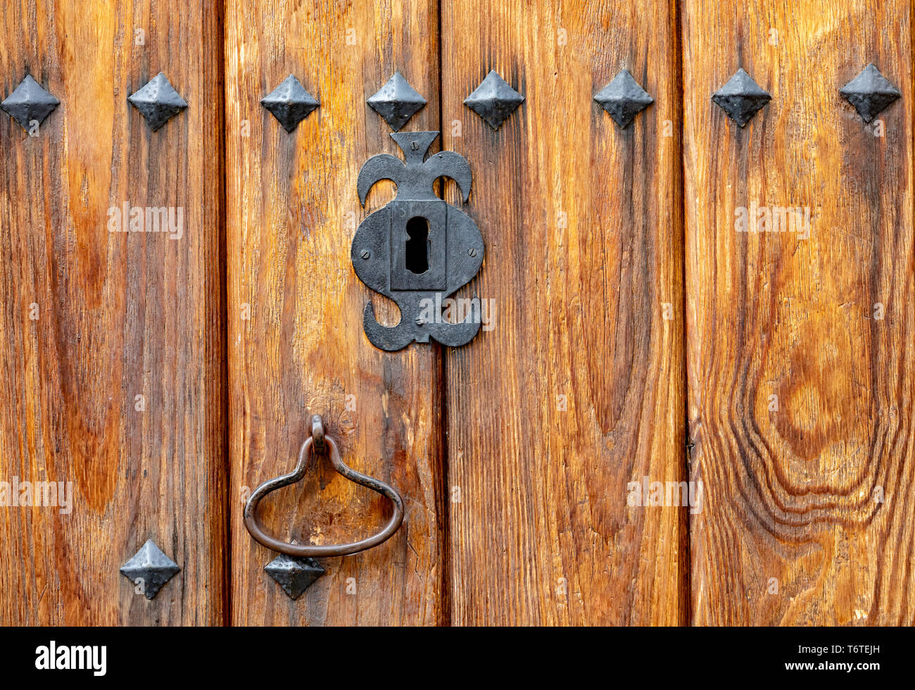Old wooden door a with rusty lock Stock Photo - Alamy