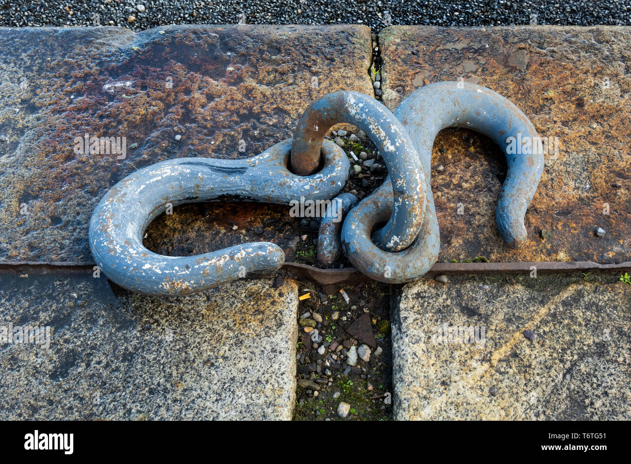 Black metal hooks, at the dock Stock Photo